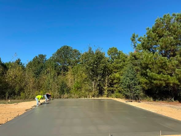A long fresh slab with trees behind it