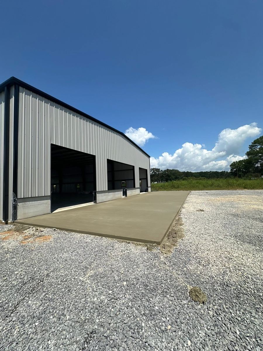 A steel building standing on a finished slab